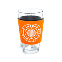 Load image into Gallery viewer, A glass with an Indeed Brewing Logo Coozies on it.
