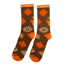 Load image into Gallery viewer, A pair of Hippy Feet Double Day Tripper socks with designs on them.
